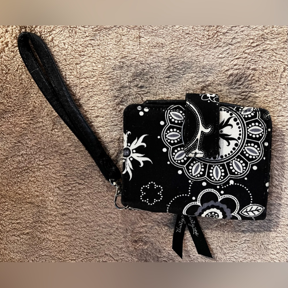 Thirty one card sorting wallet with detachable wristlet.